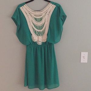 Cute green dress with detailed back